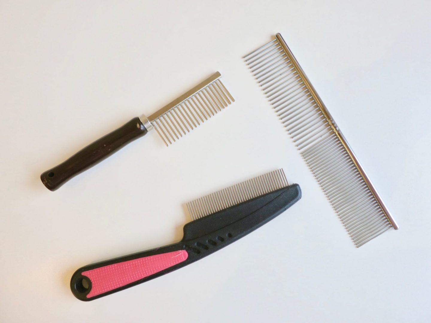 Steel combs for Persian cat grooming